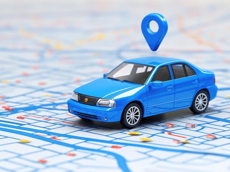 Car on a city map with a live GPS location pin above it