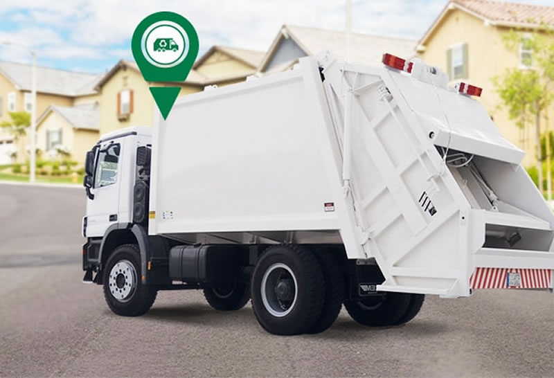 Garbage collection truck on its neighbourhood route with a tracking pin above it